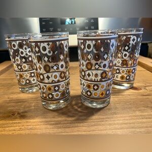 Set of Four Georges Briard Tallboy glasses with black, gold and white geometric